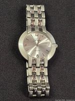 Front view of Fondini watch displaying dial and bracelet