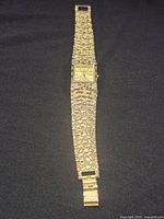 Full view of rectangular gold-tone watch