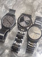 Front view of all three Timex wristwatches showing dial designs and bracelet styles