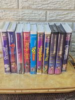 Row of 10 Disney VHS tapes showing spines