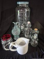 Group shot showing all glass containers and pitcher