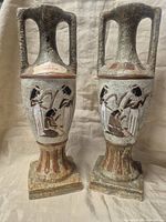 Full view of both Italian amphora-style vases showing design and size