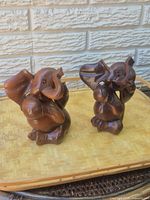 Front view of both wooden elephant bookends