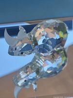 Top view of faceted crystal rhinoceros showing horns and eyes