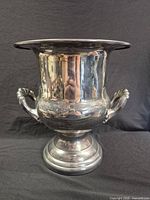 Front view of silver-plated champagne bucket