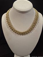 Full view of collar necklace on display bust