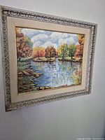Full view of framed painting on wall