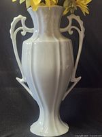 Full front view of vase showing shape and pedestal base