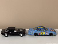 Side view of both diecast cars together