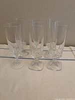 All six crystal cordial glasses grouped together showing overall design and quantity