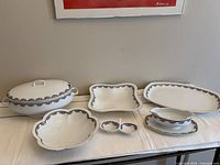 Full set showing six porcelain serving pieces