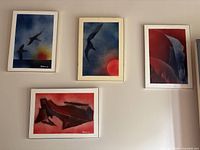 Group shot of all four framed Aitoro artworks on wall
