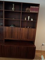 Front view of teak wall unit closed