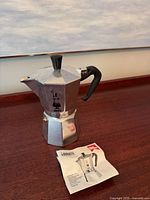 Moka pot front view with manual
