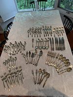 Full layout of flatware set on table