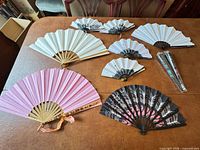 Group shot of all open fans and two sealed fans