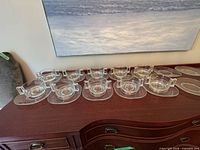 Full set of cups and saucers on surface