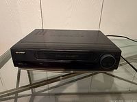 Front three-quarter view of Sharp VC-A534U VCR