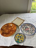 Group shot of all four ceramic pieces