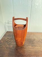 full view of wooden ice bucket with handle and lid