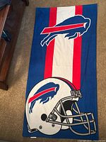 Full view of towel showing helmet and team logo design