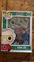Front of boxed Funko Pop! Tees Stan Lee T-shirt