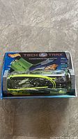 Front of sealed Hot Wheels Tech Trax Flex Loop box