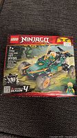 Front of LEGO Ninjago Legacy Jungle Raider box showing set 71700, 127 pcs