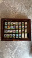 Top view of closed shadow box showing 32 cards inside