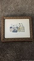 Top view showing framed lithograph on lid