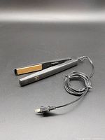 Full view of Hot + Hotter hair straightener with cord