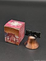 Liberty Bell figurine and box front view