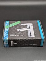 Closed retail box showing product image and name Single Lever Basin Mixer