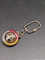 full view of keychain on black background