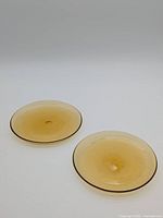 Two amber glass plates overview