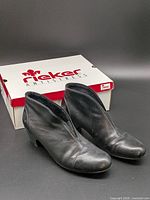 Pair of black Rieker ankle booties with original box