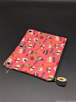 Full view of sushi print binder pouch