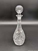 Full view of clear cut crystal decanter with stopper assembled