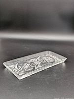 Top view showing entire rectangular crystal tray and cut patterns