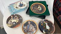 Six plates displayed front view with some boxes