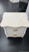 front view showing drawers, shell pulls, overall style