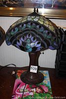 Full photo of Tiffany style stained glass lamp showing whole shade and base