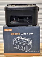 Front view of lunch box on retail box