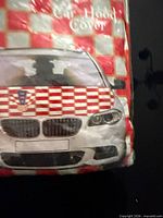 Front of packaged Denimar Croatia car hood cover showing checkered design