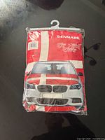 Front of packaged Denmark flag hood cover