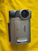 Front view showing lens, branding and body finish