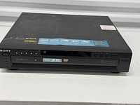 Front view of Sony DVP-NC625 showing display and disc tray