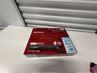 Front view of Sony DVP-SR200P retail box