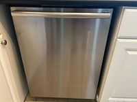 Front view of stainless steel dishwasher door