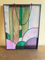 Full front view of stained glass panel showing colours and design